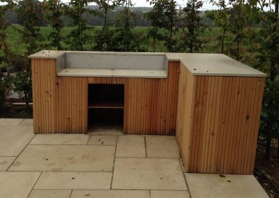 Cedar clad outdoor kitchen